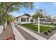 Modern house exterior with a gravel driveway and artificial turf at 929 E Granada Rd, Phoenix, AZ 85006