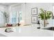 White kitchen island with built-in power outlet and gold faucet at 929 E Granada Rd, Phoenix, AZ 85006