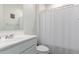 Clean bathroom with shower/tub combo, white vanity, and toilet at 9354 E Sector Dr, Mesa, AZ 85212