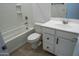 Clean bathroom with a tub, toilet and vanity at 9447 W Glenrosa Ave, Phoenix, AZ 85037