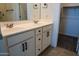 Double vanity bathroom with modern sink and cabinetry at 9447 W Glenrosa Ave, Phoenix, AZ 85037