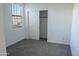 Bedroom with closet and sliding door at 9447 W Glenrosa Ave, Phoenix, AZ 85037