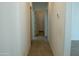 Bright hallway with tile flooring and access to rooms at 9447 W Glenrosa Ave, Phoenix, AZ 85037