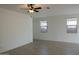 Bright living room with ceiling fan and tile flooring at 9447 W Glenrosa Ave, Phoenix, AZ 85037