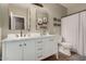 Elegant bathroom with double vanity and marble countertops at 9524 W Running Deer Trl, Peoria, AZ 85383