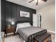 Bedroom with dark wall and metal bed frame at 9524 W Running Deer Trl, Peoria, AZ 85383