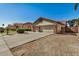 Three-car garage and gated side yard at 9524 W Running Deer Trl, Peoria, AZ 85383