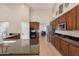 Large kitchen with granite counters and stainless steel appliances at 9524 W Running Deer Trl, Peoria, AZ 85383