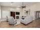 Bright and airy living room with fireplace and high ceilings at 9524 W Running Deer Trl, Peoria, AZ 85383