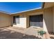 Front entrance with double doors and small patio area at 9526 W Briarwood N Cir, Sun City, AZ 85351