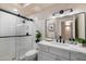 Contemporary bathroom with a walk-in shower and modern fixtures at 9915 E Cinnabar Ave, Scottsdale, AZ 85258