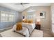 Bright bedroom with a queen-size bed and stylish decor at 9915 E Cinnabar Ave, Scottsdale, AZ 85258