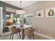 Modern kitchen nook with a window looking out to a patio at 9915 E Cinnabar Ave, Scottsdale, AZ 85258