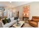 Light and airy living room with comfortable seating and decor at 9915 E Cinnabar Ave, Scottsdale, AZ 85258