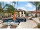 Resort-style backyard oasis with pool, spa, and gazebo at 9915 E Cinnabar Ave, Scottsdale, AZ 85258