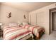 Bedroom with two twin beds and built-in closet at 9990 N Scottsdale Rd # 2048, Paradise Valley, AZ 85253