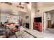 Bright living room with southwestern decor and fireplace at 9990 N Scottsdale Rd # 2048, Paradise Valley, AZ 85253