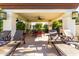 Relaxing covered patio area with lounge chairs near the pool at 9990 N Scottsdale Rd # 2048, Paradise Valley, AZ 85253