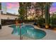 Relaxing kidney-shaped pool with waterfall feature at 11748 N 80Th Pl, Scottsdale, AZ 85260