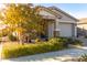 Single-story home with a two-car garage and landscaped front yard at 10333 E Tahoe Ave, Mesa, AZ 85212