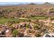 Expansive desert home on a golf course with scenic mountain views in a lush, landscaped setting at 10420 E Morning Vista Ln, Scottsdale, AZ 85262