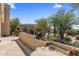 Beautiful desert landscaped backyard with putting green at 10420 E Morning Vista Ln, Scottsdale, AZ 85262