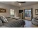 Guest bedroom featuring a comfy bed, en-suite bathroom, and plenty of natural light at 10420 E Morning Vista Ln, Scottsdale, AZ 85262