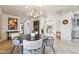 Eat-in dining area with stylish chairs and modern lighting fixtures at 10420 E Morning Vista Ln, Scottsdale, AZ 85262