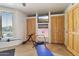 Home gym with exercise machine, TV, and view of the outdoors at 10420 E Morning Vista Ln, Scottsdale, AZ 85262