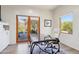 Home office with french doors, hardwood floors, and desert view at 10420 E Morning Vista Ln, Scottsdale, AZ 85262