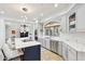 Bright kitchen featuring white countertops, stainless steel appliances, and a large island with seating at 10420 E Morning Vista Ln, Scottsdale, AZ 85262