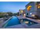 Elegant backyard pool and spa with a spacious patio at 10420 E Morning Vista Ln, Scottsdale, AZ 85262