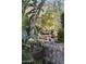 Serene water feature with lush landscaping, creating a tranquil oasis at 10420 E Morning Vista Ln, Scottsdale, AZ 85262