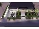 A stunning aerial view shows the home's driveway, landscaping, and modern design at 11612 N 86Th St, Scottsdale, AZ 85260