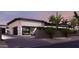Spacious garage boasts modern design, with the capacity to park multiple cars at 11612 N 86Th St, Scottsdale, AZ 85260