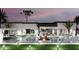 Backyard pool with a fire pit, modern lighting, and lounge chairs at 11612 N 86Th St, Scottsdale, AZ 85260