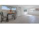 Cozy dining area with small table and chairs near a window at 12023 N 113Th Ave, Youngtown, AZ 85363