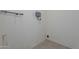 Small laundry room with space for a washer and dryer at 12023 N 113Th Ave, Youngtown, AZ 85363