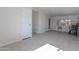 Bright sunroom featuring tile floors and ample natural light at 12023 N 113Th Ave, Youngtown, AZ 85363
