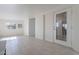 Sunroom with tile flooring and multiple windows at 12023 N 113Th Ave, Youngtown, AZ 85363
