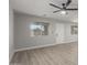 Spacious living area featuring neutral walls and a modern ceiling fan at 1343 N Crane St, Casa Grande, AZ 85122