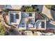 Aerial view of the home, showing solar panels on the roof at 13503 E Summit Dr, Scottsdale, AZ 85259