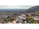 Aerial view of community, showcasing homes and mountain backdrop at 13503 E Summit Dr, Scottsdale, AZ 85259