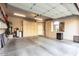 Well-organized garage with built-in cabinets and ample storage at 13503 E Summit Dr, Scottsdale, AZ 85259