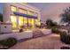 Back patio with seating area, built-in grill, and stunning sunset views at 13503 E Summit Dr, Scottsdale, AZ 85259