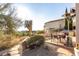 Relaxing patio features a dining area and stunning desert landscape at 13503 E Summit Dr, Scottsdale, AZ 85259