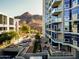 Community with courtyard, fountain, and mountain backdrop at 140 E Rio Salado Pkwy # 111, Tempe, AZ 85281