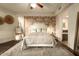 Serene bedroom with a comfortable bed and ensuite bathroom access at 140 E Rio Salado Pkwy # 111, Tempe, AZ 85281