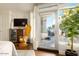 Bedroom with patio access and wicker chair at 140 E Rio Salado Pkwy # 111, Tempe, AZ 85281