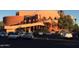 Building with arched entryway and parking lot at 140 E Rio Salado Pkwy # 111, Tempe, AZ 85281
